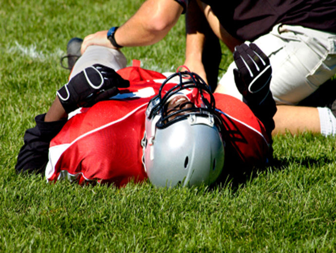 Football players tackle injury with Massage Therapy
